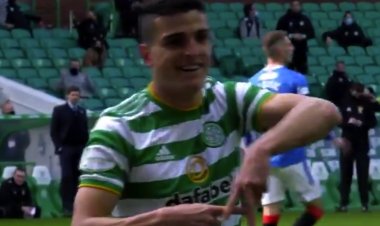 EVERY PICTURE TELLS A STORY: ELYOUNOUSSI GRINS, GERRARD GROANS