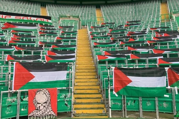 Green Brigade deck out Celtic Ultras section with Palestine flags
