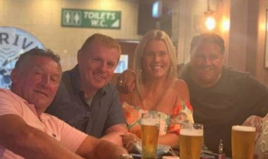 Ex Celtic manager Neil Lennon is all smiles as he is pictured drinking pint