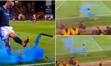 Footage shows the scary moment Leigh Griffiths booted flare at rival fans during defeat