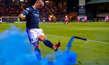 Griffiths apologises for kicking smoke bomb into fans
