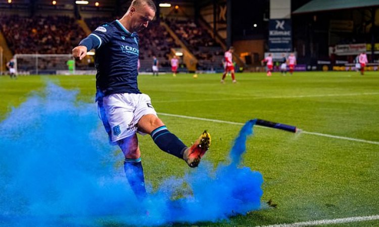 Leigh Griffiths apologises after kicking smoke bomb into the CROWD